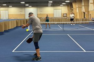 Newly completed pickleball courts at Buffalo County Fairgrounds with a stadium blue surface and white boundary lines, designed by Pro Track & Tennis.