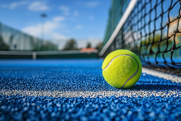Newly completed pickleball courts at Buffalo County Fairgrounds with a stadium blue surface and white boundary lines, designed by Pro Track & Tennis.