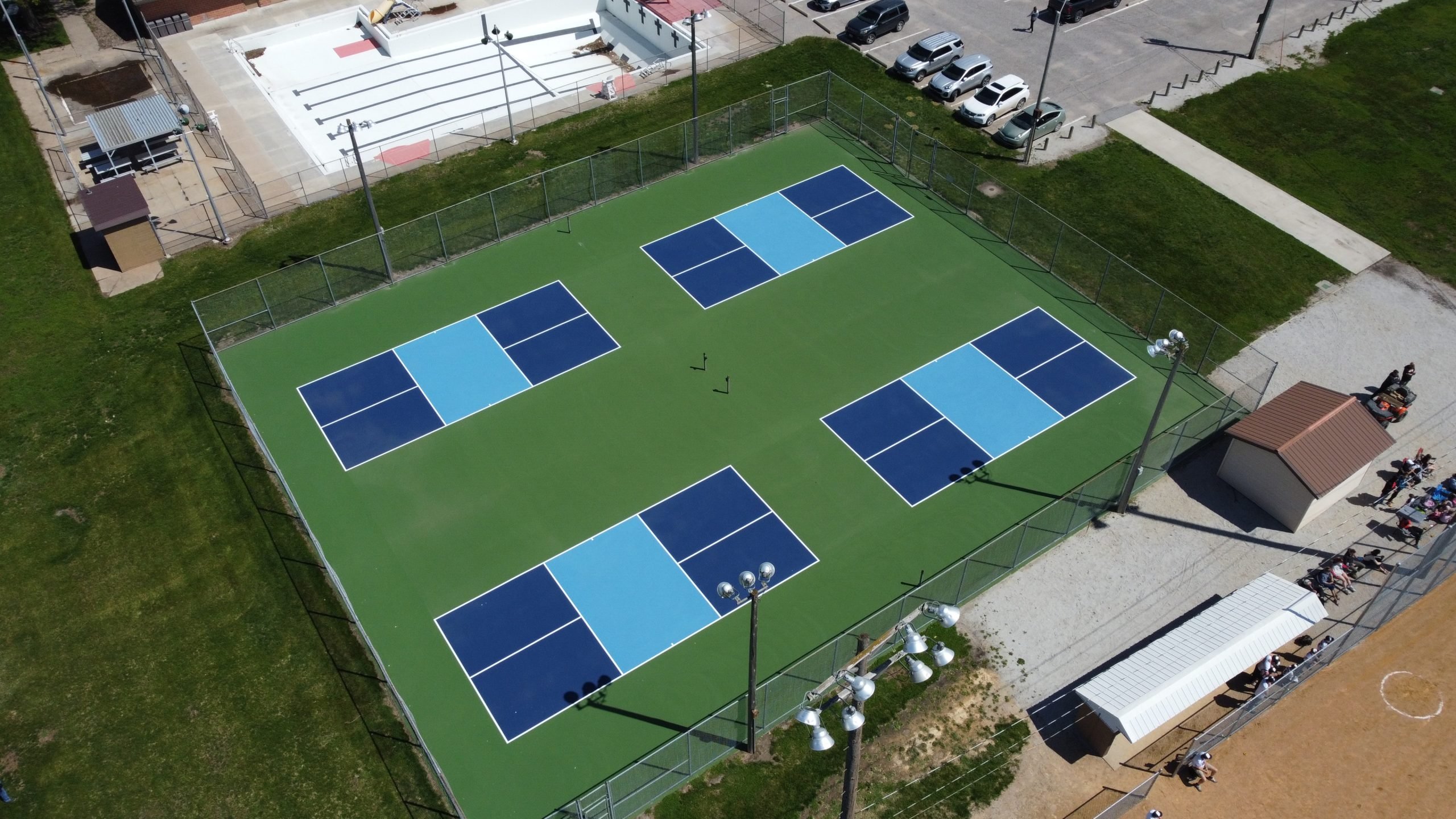 Dedicated outdoor pickleball courts with fresh color coating