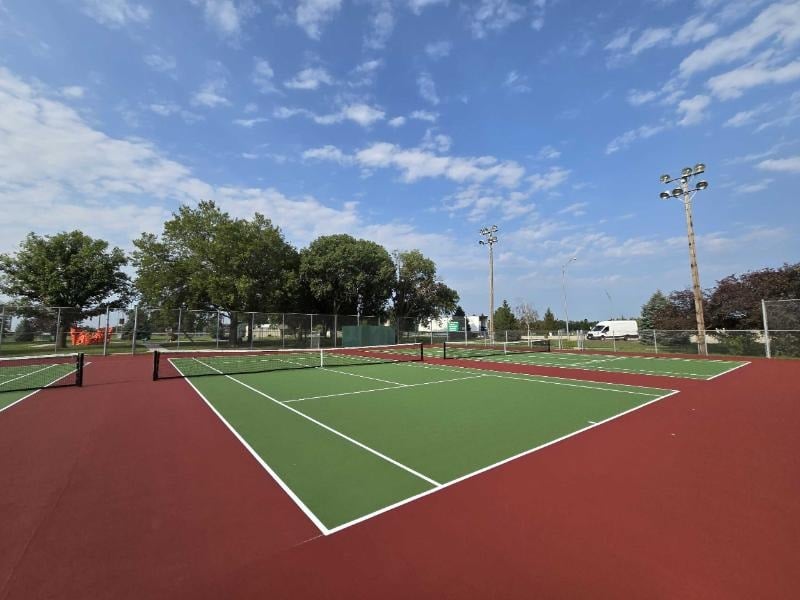 tennis court with clear playing lines and durable surface
