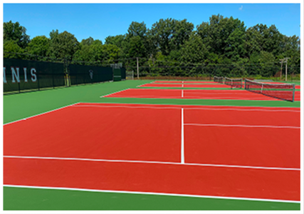 Resurfaced red acrylic tennis courts designed for durability in diverse climates