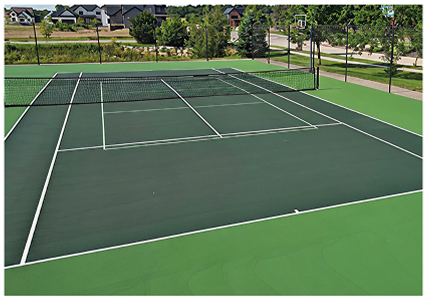 Resurfaced green acrylic tennis courts in Waunakee, Wisconsin