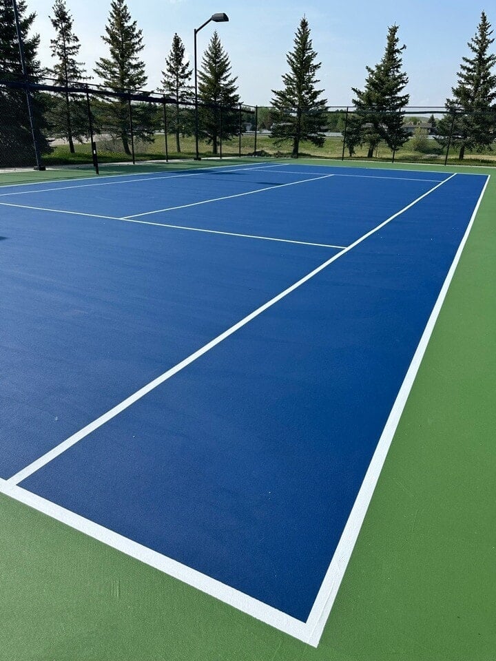 Fresh New Lines and paint for an outdoor tennis court