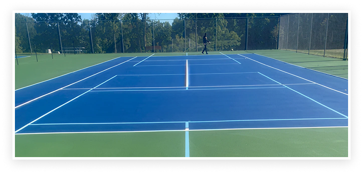 Blue and green outdoor pickleball court resurfaced by in-house professional crew from Pro Track & Tennis