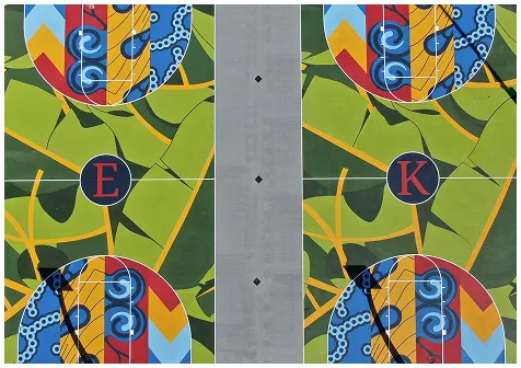 Colorful multi-purpose court mural with abstract designs and multiple sports zones viewed from above