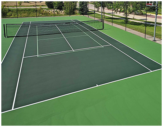 Green pickleball courts with black nets and durable acrylic surface designed for long-term performance