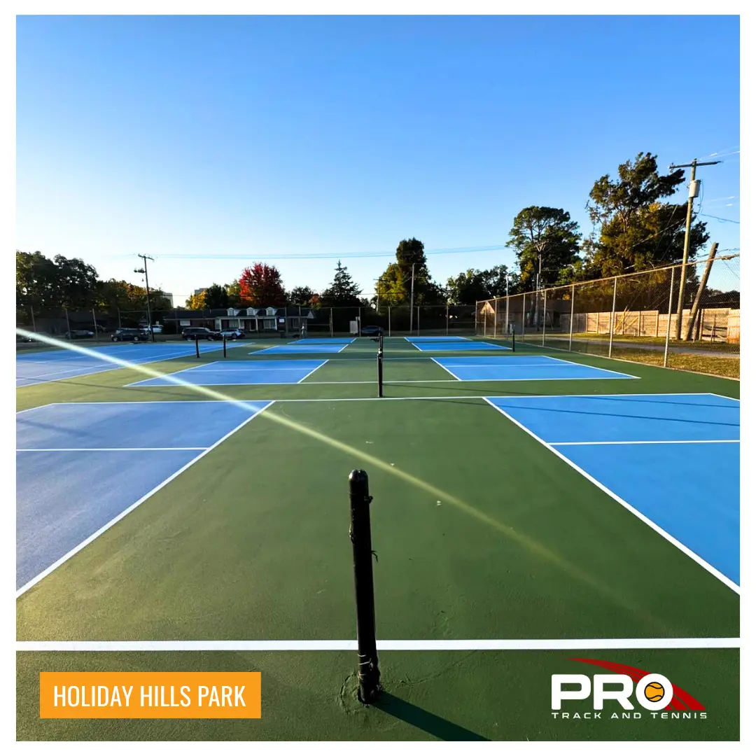 holiday hills park - square Multi-court outdoor athletic area at Holiday Hills Park with newly resurfaced blue-and-green courts and clear game lines.